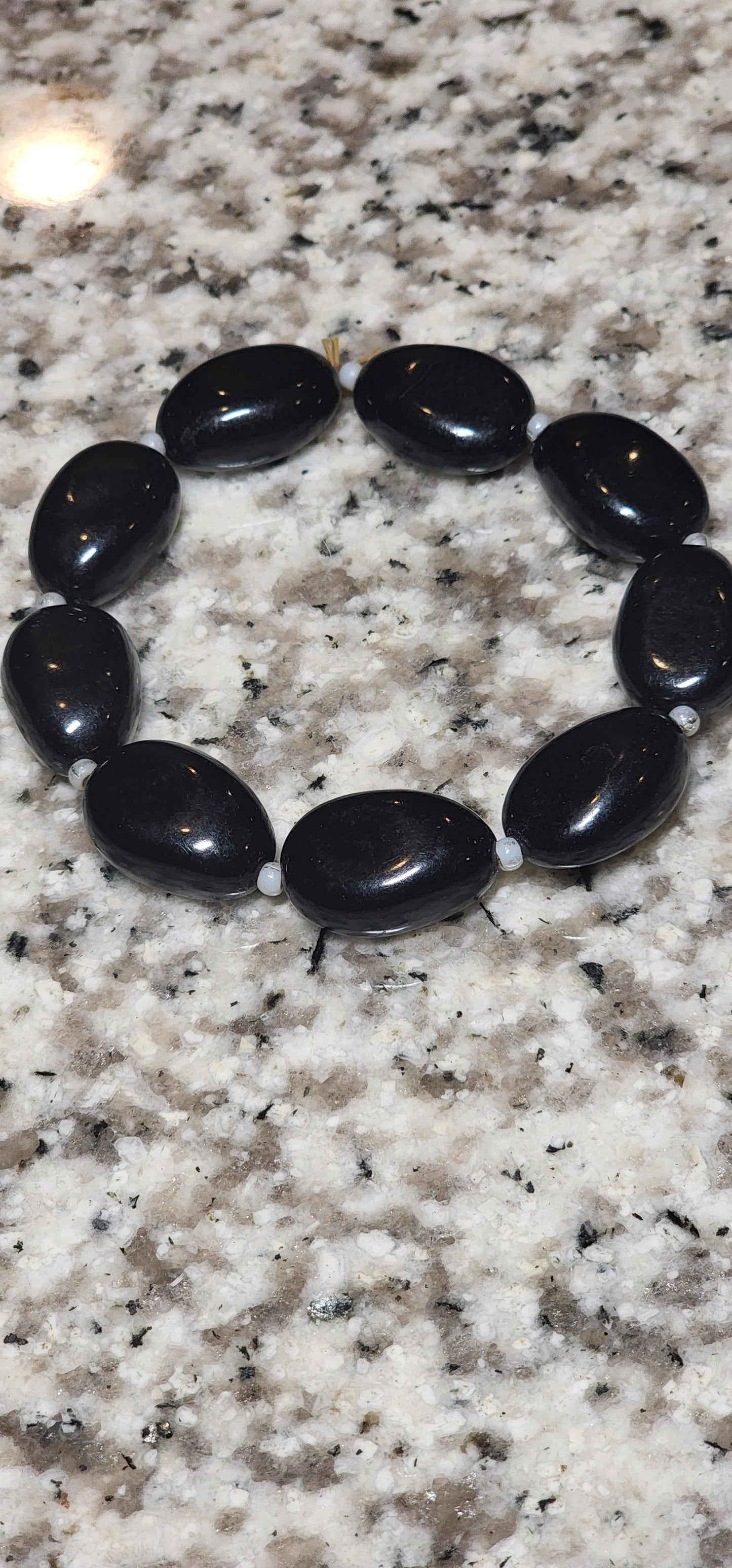 Black Polished Stone Bead Bracelet â€” Stretch Fit